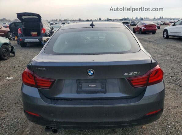 WBA4J1C06LBU68417 2020 BMW 4 SERIES Gray Rear view