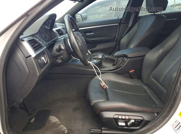 WBA4J1C52KBM17006 2019 BMW 4 SERIES White Widok wnętrza z przodu