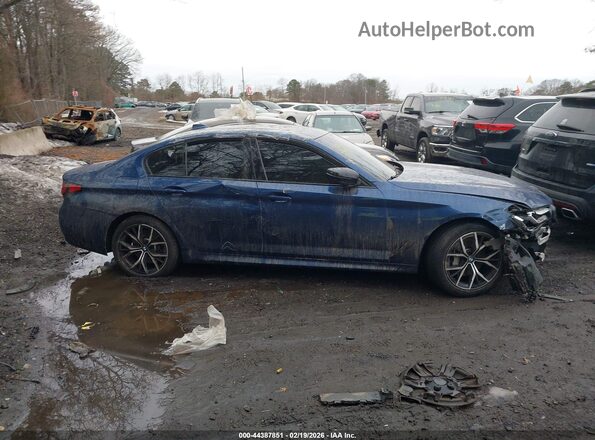WBA73BJ06NCK07835 2022 BMW 5 SERIES Blue Սալոնի հետևի տեսք