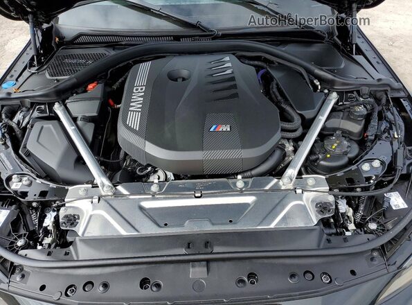 WBA73DA0XSCU66299 2025 BMW M4 Black Widok wnętrza z tyłu