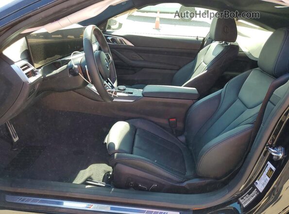 WBA73DA0XSCU66299 2025 BMW M4 Black Widok wnętrza z przodu