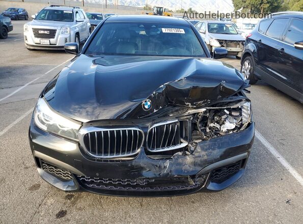 WBA7E2C58KB218548 2019 BMW 7 SERIES Black Front view