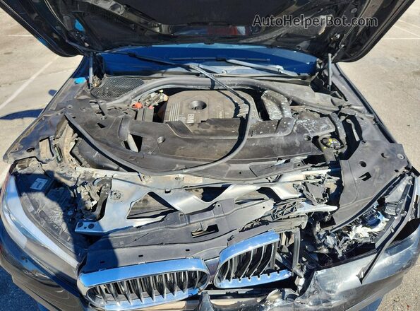 WBA7E2C58KB218548 2019 BMW 7 SERIES Black Rear interior view