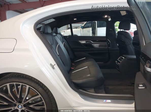 WBA7F0C53KGM24977 2019 BMW 7 SERIES White Вид наклейки з VIN-кодом