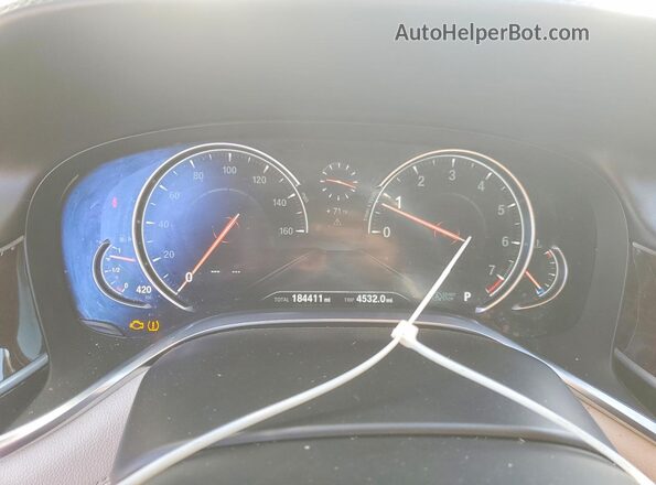 WBA7F0C55GGL99409 2016 BMW 7 SERIES Gray ხელსაწყოთა პანელის ხედი