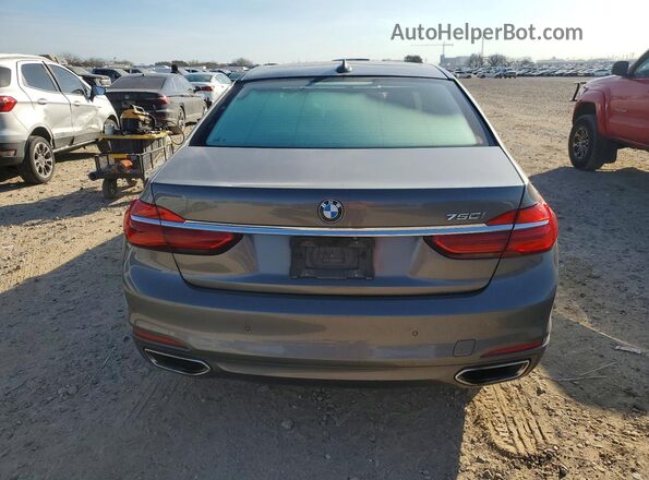 WBA7F0C55GGL99409 2016 BMW 7 SERIES Gray უკანა ხედი
