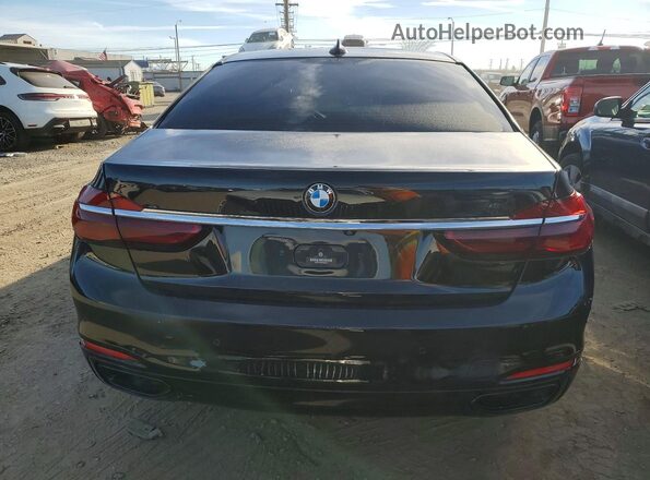 WBA7F0C59GGM20875 2016 BMW 7 SERIES Black Front interior view