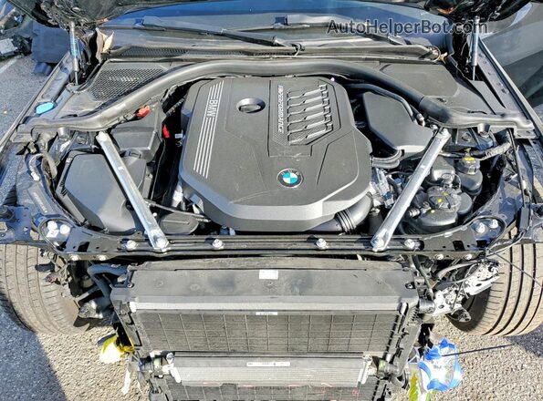 WBA83AP01PCL98184 2023 BMW M4 Black Vista interior trasera