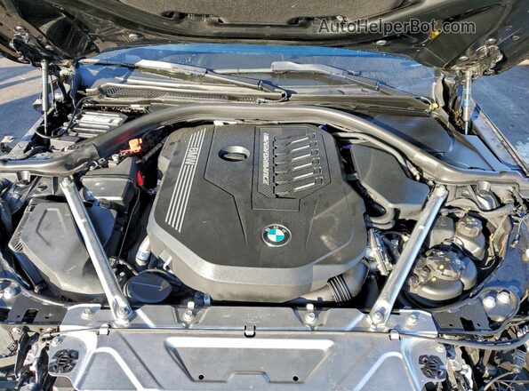 WBA83AP01PCM21446 2023 BMW M4 Black Vista interior trasera