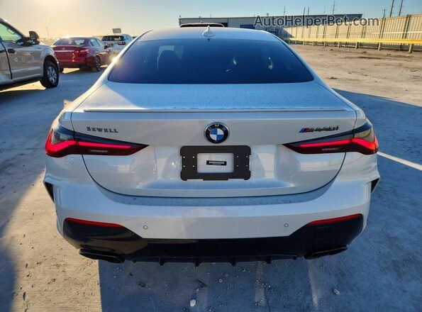 WBA83AP02PCL62987 2023 BMW M4 White Vista trasera