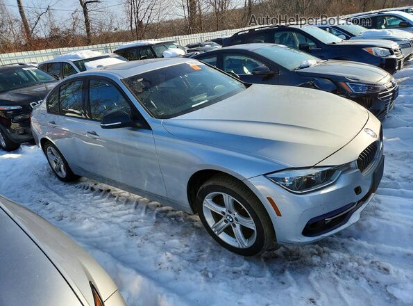 WBA8E3C53GK504907 2016 BMW 3 SERIES Silver Delantero derecho