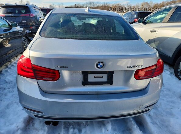 WBA8E3C53GK504907 2016 BMW 3 SERIES Silver Vista trasera