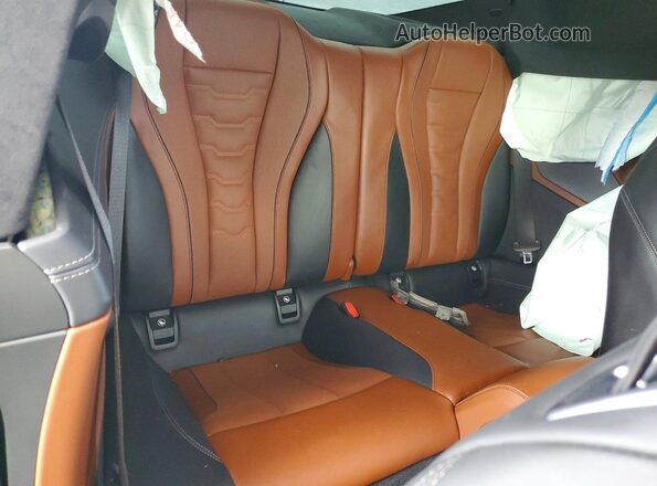 WBAAE2C00RCN72191 2024 BMW 8 SERIES Green Հետևի նստատեղերի տեսք