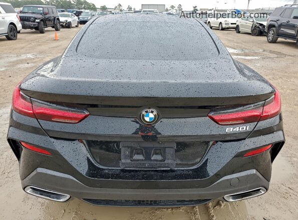 WBAAE2C09RCN70245 2024 BMW 8 SERIES Black Հետևի տեսք