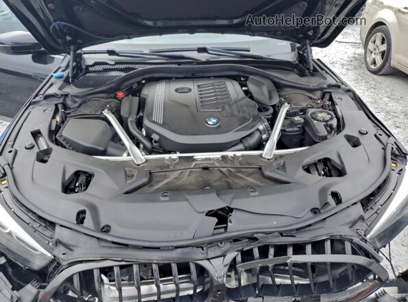 WBAGV2C0XNCH81865 2022 BMW 8 SERIES Черный Вид задней части салона