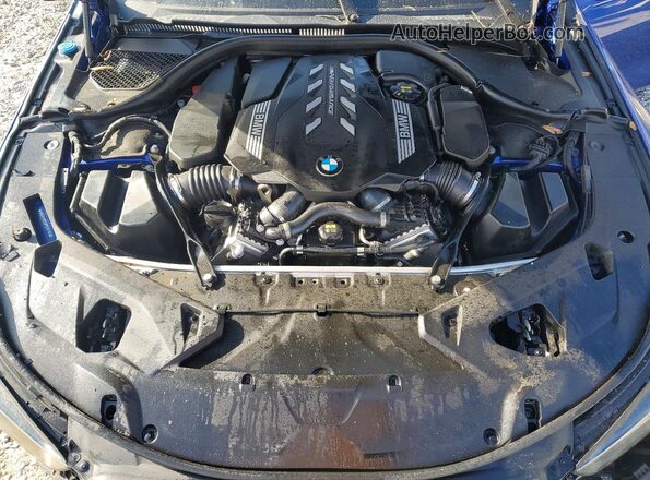WBAGV8C02PCL67191 2023 BMW M8 Blue Rear interior view