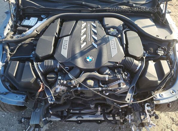 WBAGV8C05NCJ84106 2022 BMW M8 Gray Widok wnętrza z tyłu