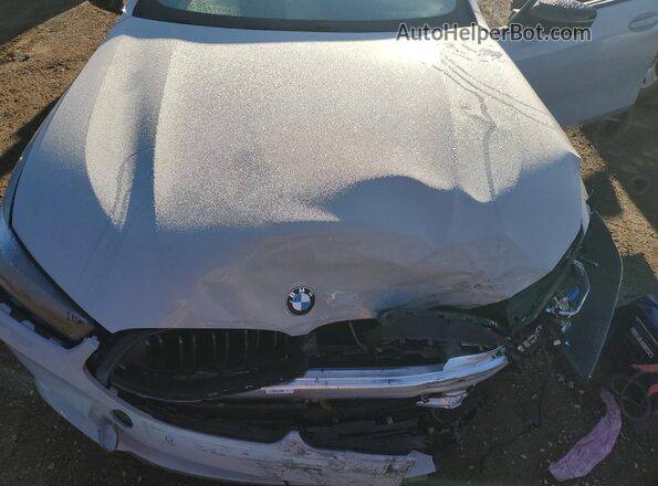 WBAGV8C05TCV22956 2026 BMW M8 Gray Սալոնի հետևի տեսք