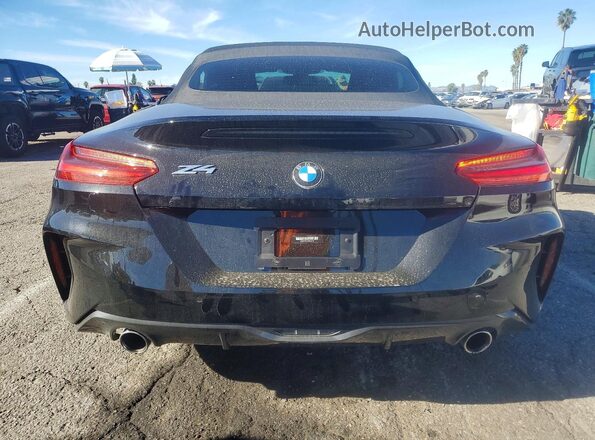 WBAHF3C07MWX34732 2021 BMW Z4 Black Rear view