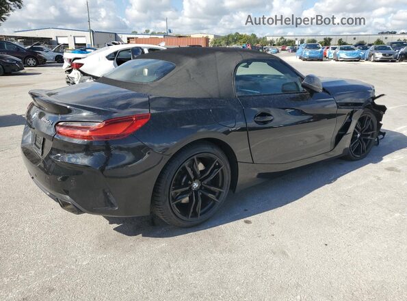WBAHF9C01LWW40007 2020 BMW Z4 Black Trasero derecho