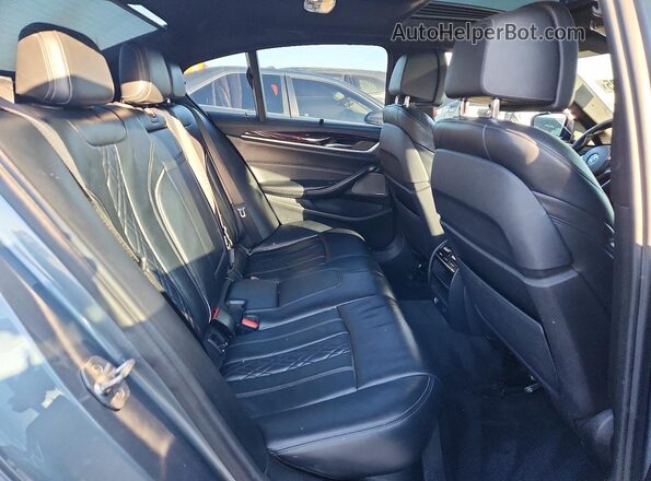 WBAJB9C53JG463671 2018 BMW M5 Gray Սալոնի հետևի տեսք
