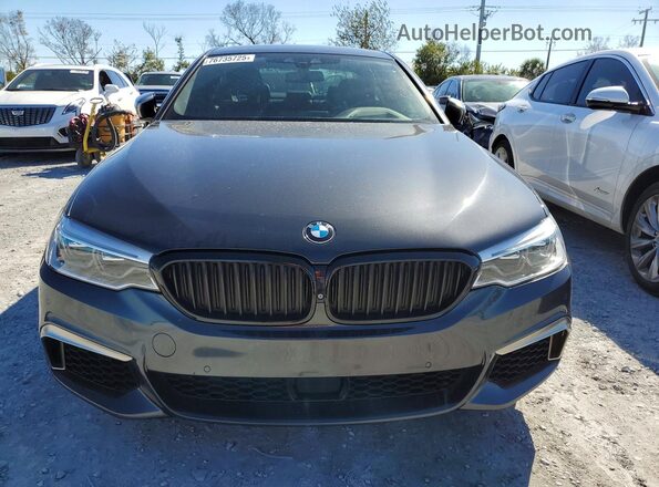 WBAJS7C06LCD34796 2020 BMW M5 Charcoal Front view