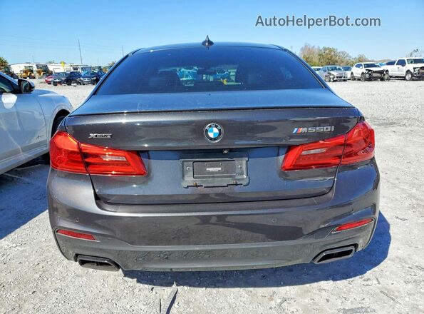 WBAJS7C06LCD34796 2020 BMW M5 Charcoal Rear view