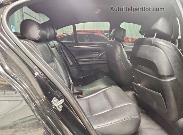 WBAKP9C55GD980289 2016 BMW 5 SERIES Black Vista de los asientos traseros
