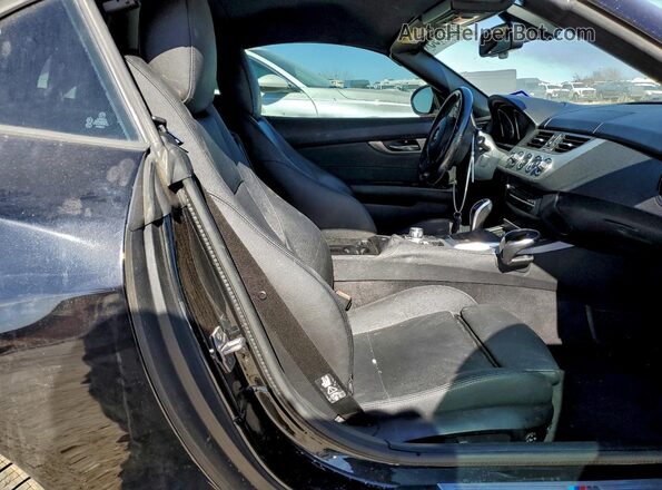 WBALM7C56G5B59863 2016 BMW Z4 Black უკანა სავარძლების ხედი
