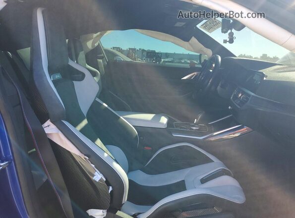 WBS33AZ01PCM12653 2023 BMW M4 Blue Vista de los asientos traseros