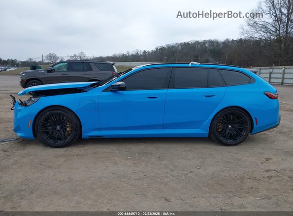 WBS83GV05TCW97737 2026 BMW M5 Blue Սալոնի հետևի տեսք