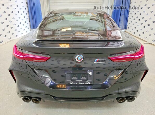 WBSAE0C02PCL26790 2023 BMW M8 Black Հետևի տեսք