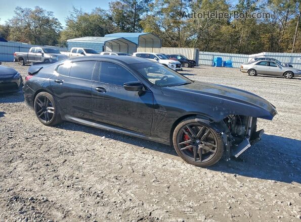 WBSGV0C09RCR90503 2024 BMW M8 Черный Передняя правая четверть