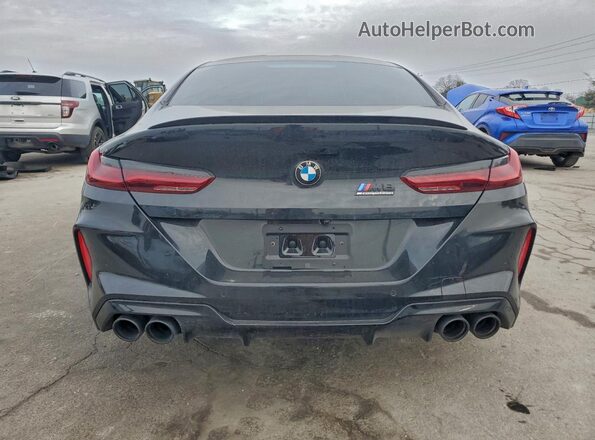 WBSGV0C0XSCT98534 2025 BMW M8 Black Vista trasera