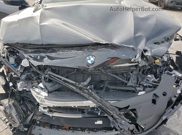 WBSGV0C0XSCT98534 2025 BMW M8 Black Vista interior trasera