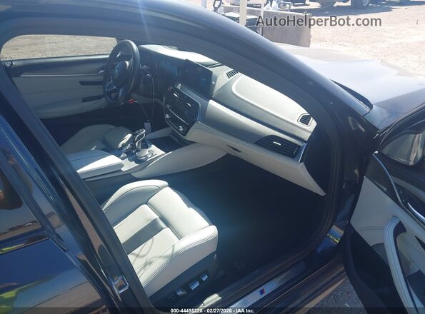 WBSJF0C54JB282104 2018 BMW M5 Black წინა სალონის ხედი