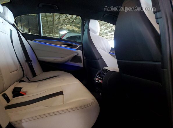 WBSJF0C55KB284364 2019 BMW M5 Charcoal Vista de los asientos traseros