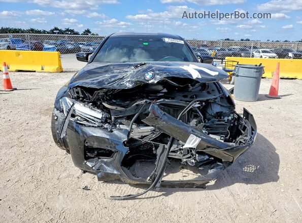 WBSJF0C5XKB446893 2019 BMW M5 Black Вид спереду