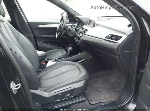 WBXHT3C30GP883734 2016 BMW X1 Black Front interior view