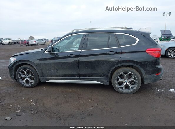 WBXHT3C30GP883734 2016 BMW X1 Black 360 interior view