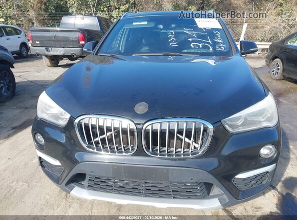 WBXHT3C34H5F83145 2017 BMW X1 Черный Вид задней части салона