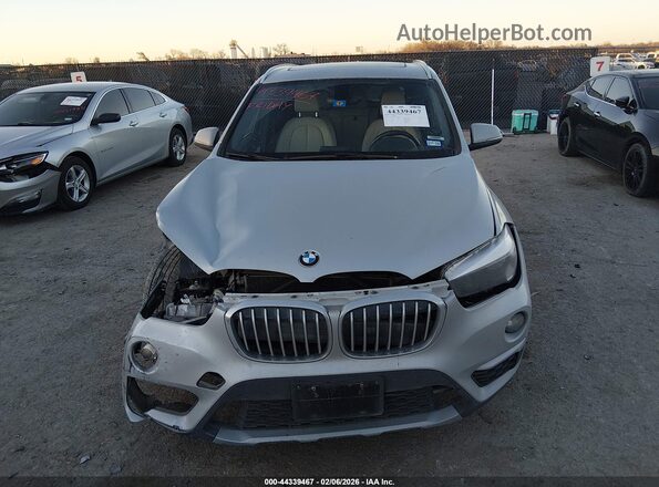 WBXHT3C34J5L34105 2018 BMW X1 Silver ხელსაწყოთა პანელის ხედი