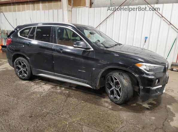 WBXHT3C35H5F87284 2017 BMW X1 Черный Передняя правая четверть