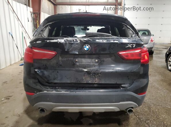 WBXHT3C35H5F87284 2017 BMW X1 Черный Вид сзади