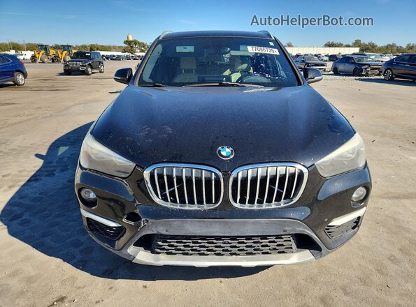 WBXHT3C37H5F87044 2017 BMW X1 Black Widok z tyłu