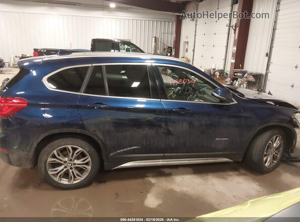 WBXHT3C38GP887188 2016 BMW X1 Blue Вид задньої частини салону