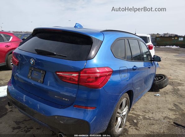 WBXHT3C54K5L36696 2019 BMW X1 Blue Trasero derecho