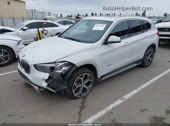 WBXHT3Z30J4A66475 2018 BMW X1 White წინა მარცხენა ხედი სამი მეოთხედიდან