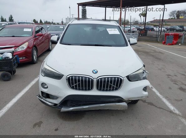 WBXHT3Z30J4A66475 2018 BMW X1 White ხელსაწყოთა პანელის ხედი