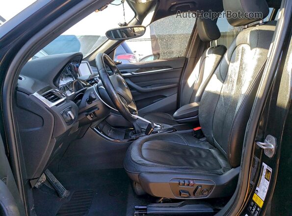 WBXHT3Z33G4A50294 2016 BMW X1 Black Vista interior delantera